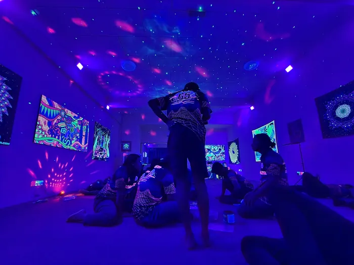 Starry UV ceiling over the gallery floor