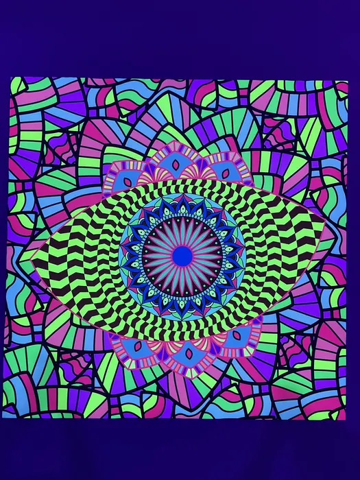 Psychedelic eye mandala under blacklight